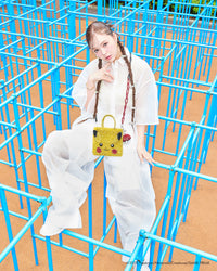 ANTEPRIMA_WIREBAG_POKEMON_POKE_BALL_PA25FPM2G8_Bag_Charm_solid-red_PIKACHU_PB25FPM0LY_STANDARD_Z_Crossbody_bright-yellow_Nicole_Fujita