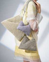 SS25_Main_2_TWIST_BAG_MINI_PB25FP63K9_LAVANDAGENTO_TWIST_BAG_SMALL_PB23SP64F5_KHAKIGENTO_TWIST_BAG_LARGE_PB23FP65B1_LATTE_OPACO_91ba57ba-46c4-4f18-87ab-133f7c1c8ef5